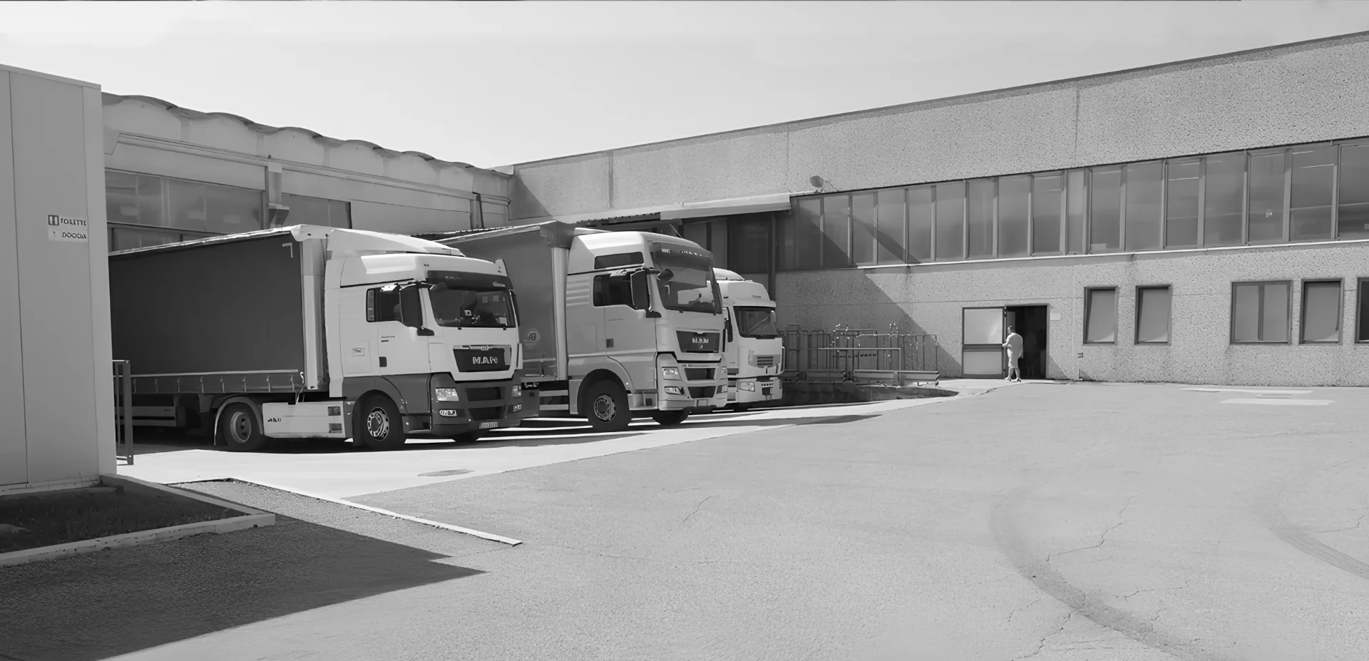 Trucks waiting to depart at a logistics hub