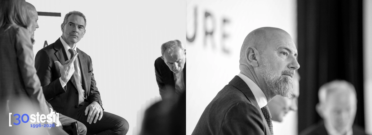 Miragliotta and Pistorello on stage Stesi speaking to an audience of 200 people