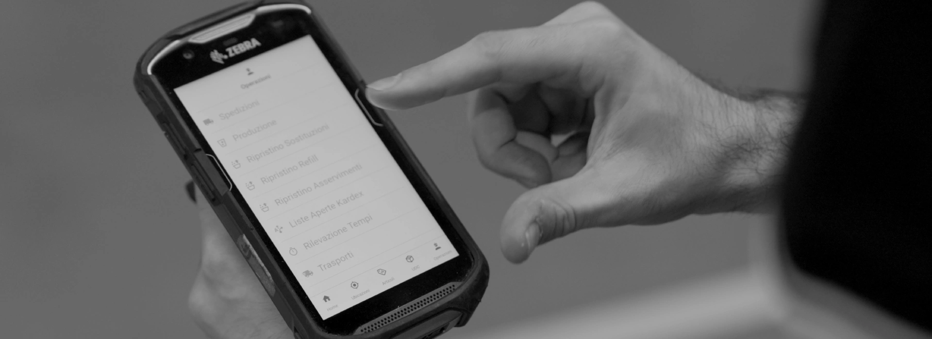 ERP vs WMS: an operator uses WMS software integrated with SAP ERP via a mobile terminal