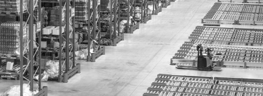 shelving and forklift trucks in a modernised warehouse