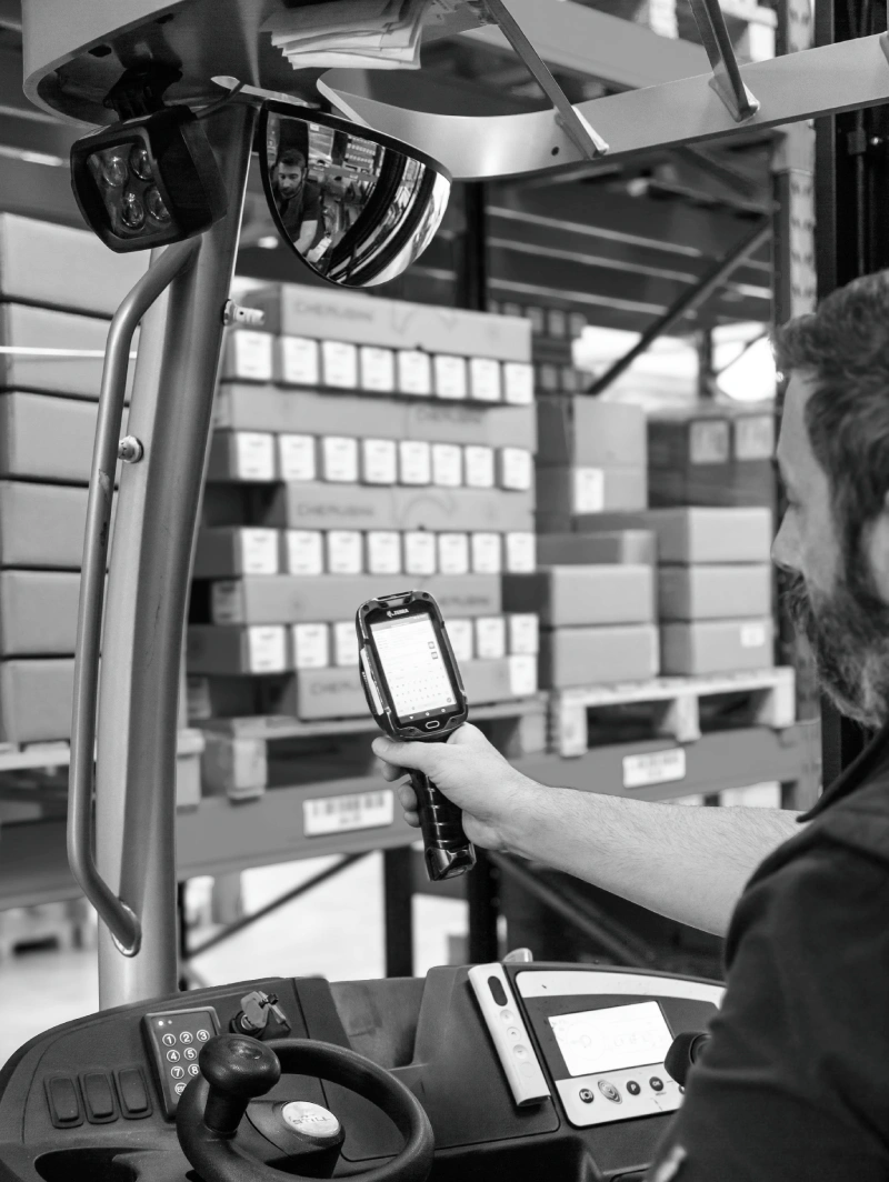 Warehouse operator at Cherubini using Stesi's silwa WMS on a mobile terminal mounted on a forklift