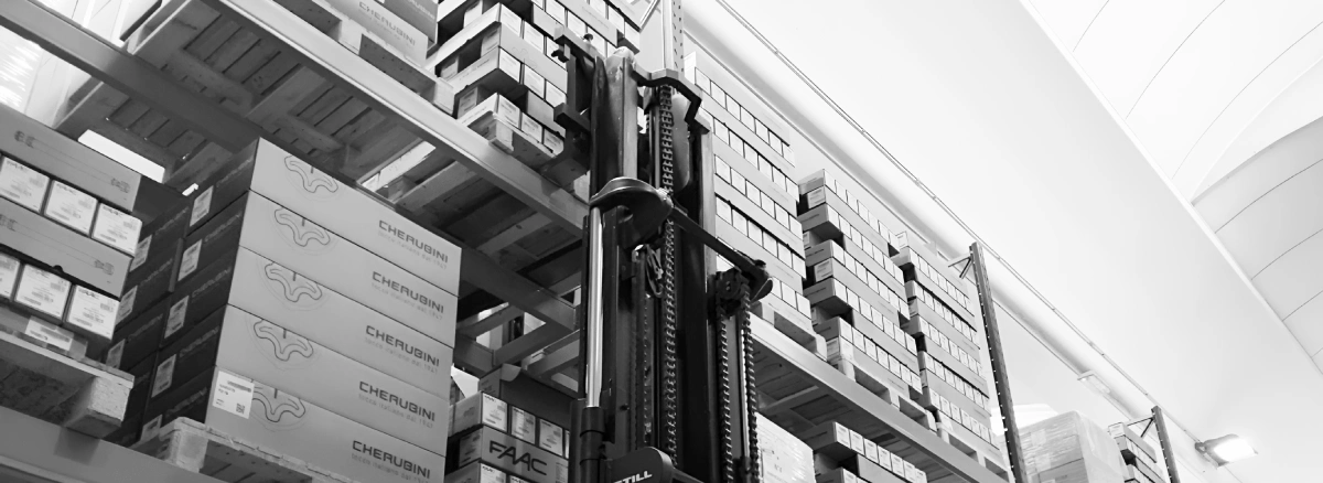 Warehouse forklift collecting pallets at Cherubini